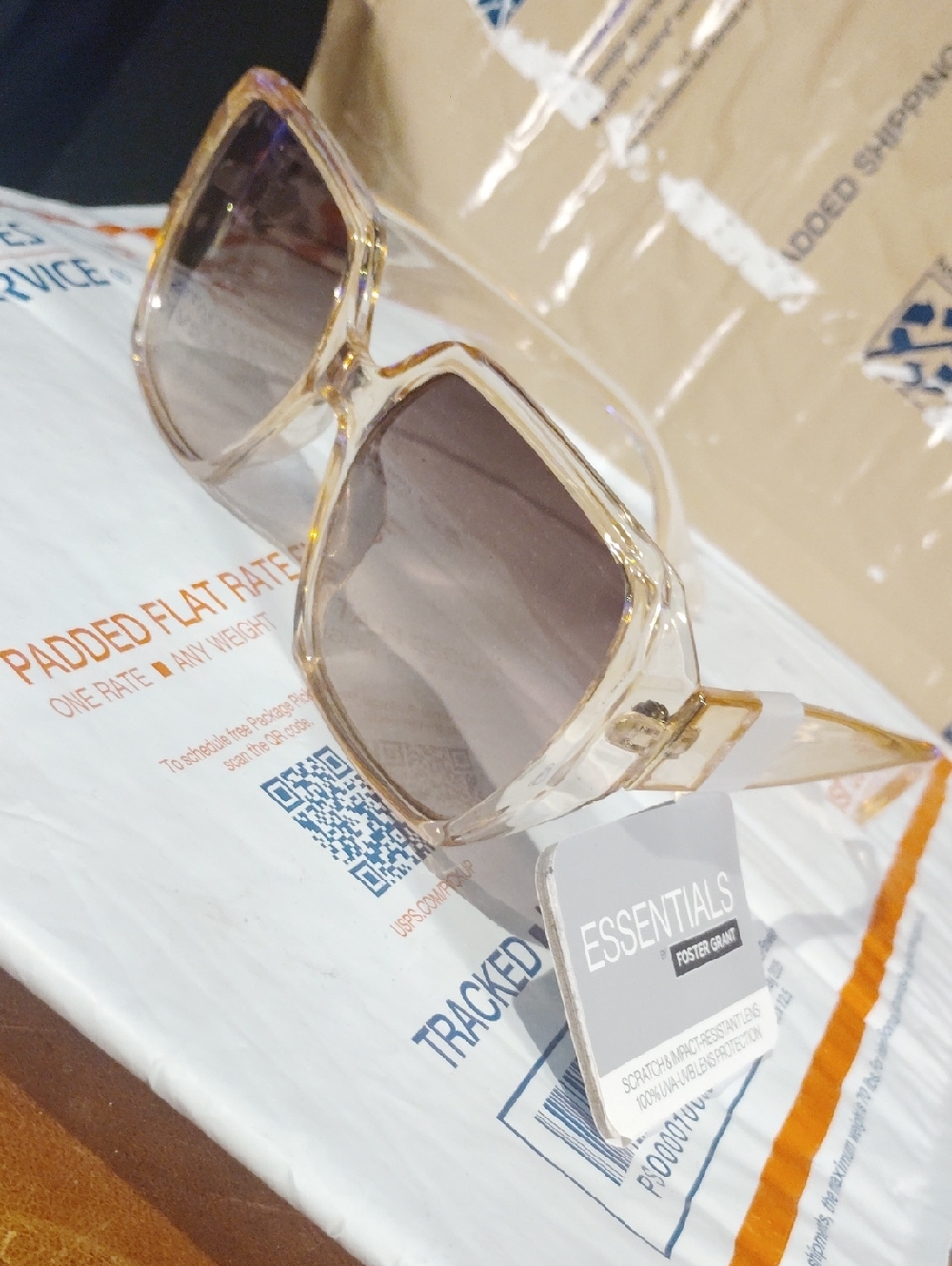 ESSENTIALS Clear Frame Sunglasses with Gold Accents and Brown Gradient Lenses